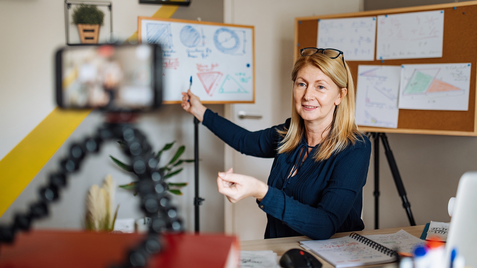 Photo of cheerful professor communicate with pupils over video call for Learning Forward Website