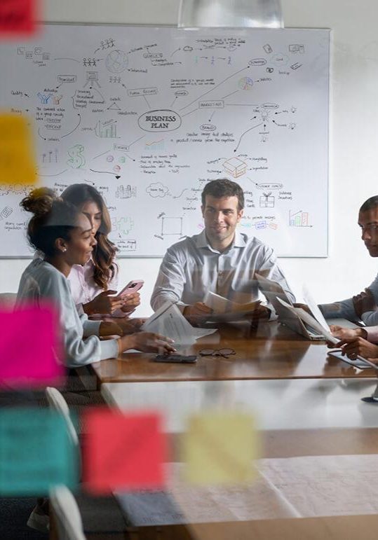 people in a business meeting planning their systems of learning